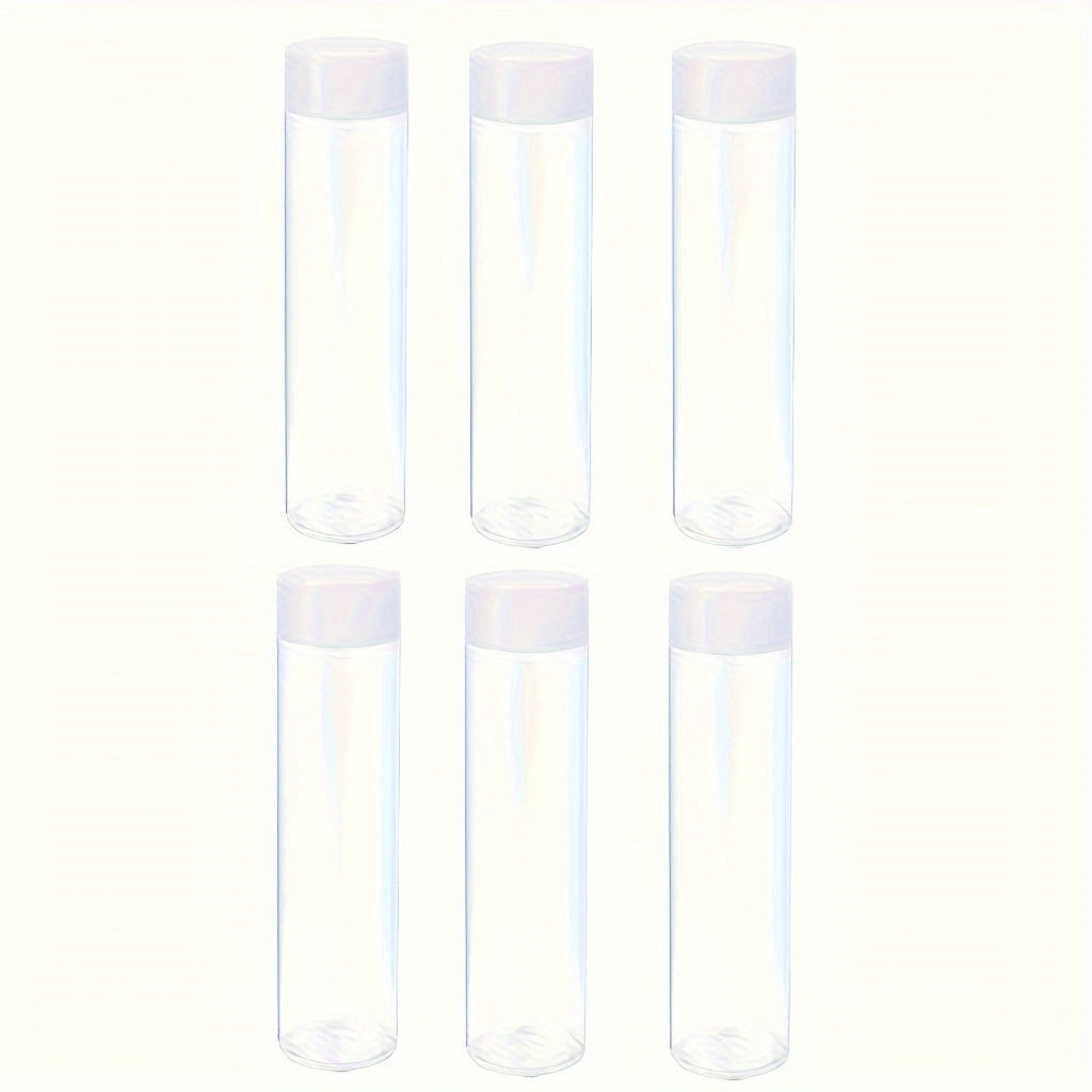 Six clear plastic sensory bottles with lids, each holding 10oz. These reusable water bottles are uncoated and perfect for classroom use, handmade crafts, and party supplies.