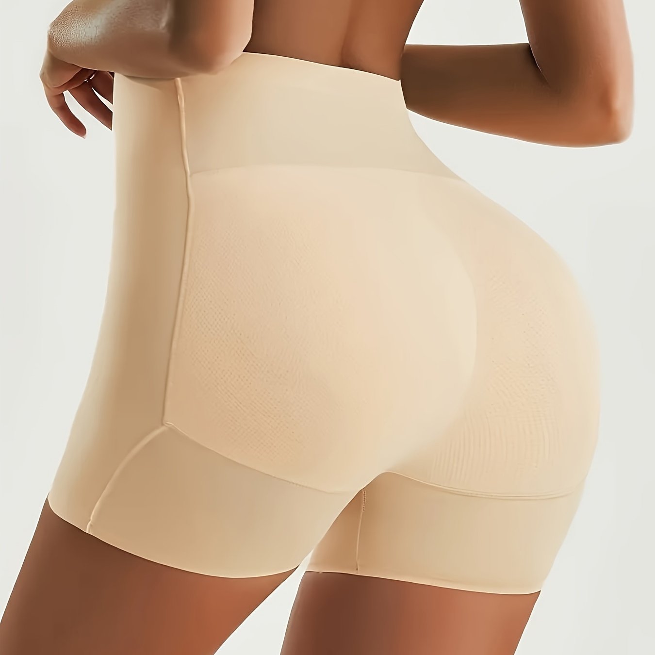 High waist shaping shorts for women made of 82.90% polyamide and 17.10% elastane knit fabric. Features solid color with contrast mesh, medium support, butt lifter, and tummy control. No