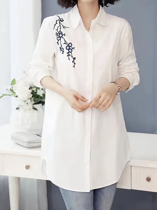 Stylish white polyester blouse with floral design, collared and machine washable for women; perfect for spring, summer, and fall.