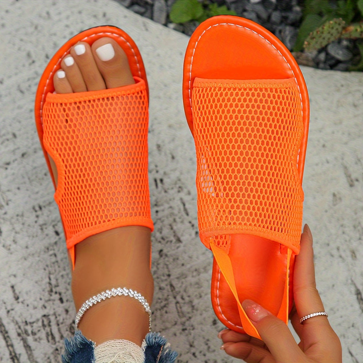 Breathable mesh slip-on sandals perfect for walking and the beach, designed for women.