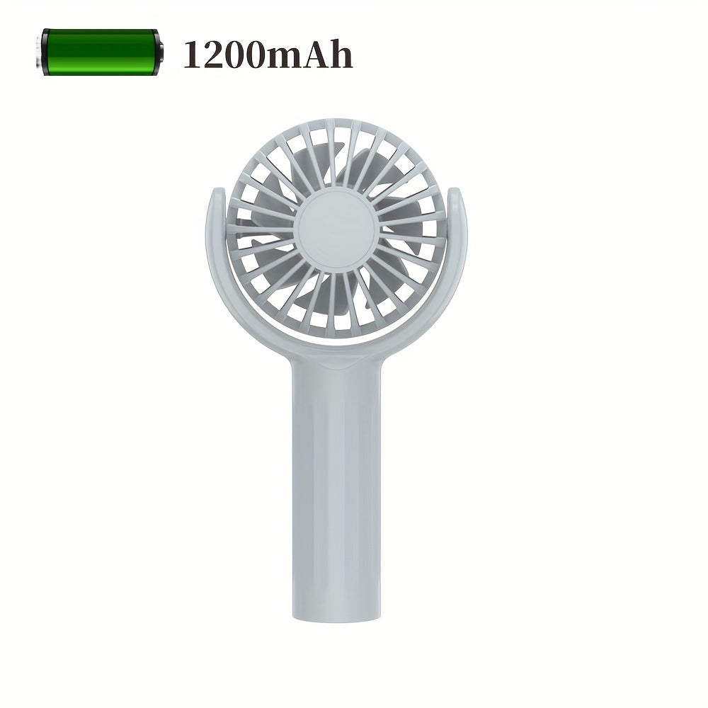 Портативный ручной вентилятор с зарядкой через USB, идеально подходящий для использования на открытом воздухе, с большим объемом воздуха и небольшим размером для удобства транспортировки.