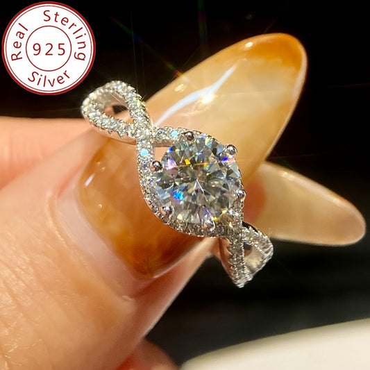 This 1-carat Moissanite ring, crafted with 925 Sterling Silver, shines brightly. It weighs approximately 5.2 grams for size 5, 2.3 grams for size 6, 2.4 grams for size 7, and 3 grams for sizes 8-10. Ideal for proposals, engagements, weddings, and