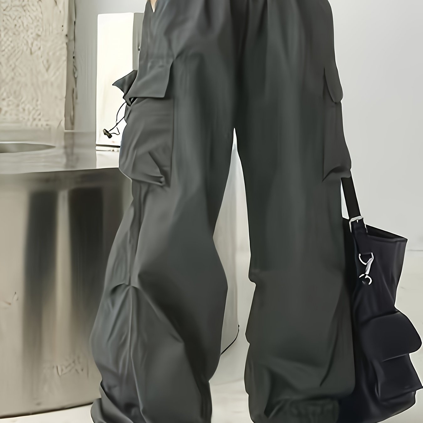 Wide leg cargo pants with flap pockets, drawstring closure. Perfect for spring and summer. Women's casual clothing.