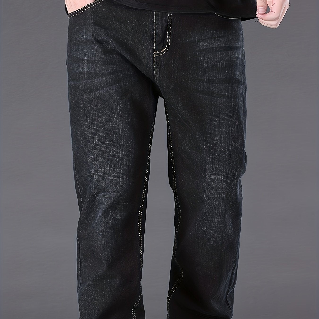 Men's solid denim pants for spring and fall in plus sizes.