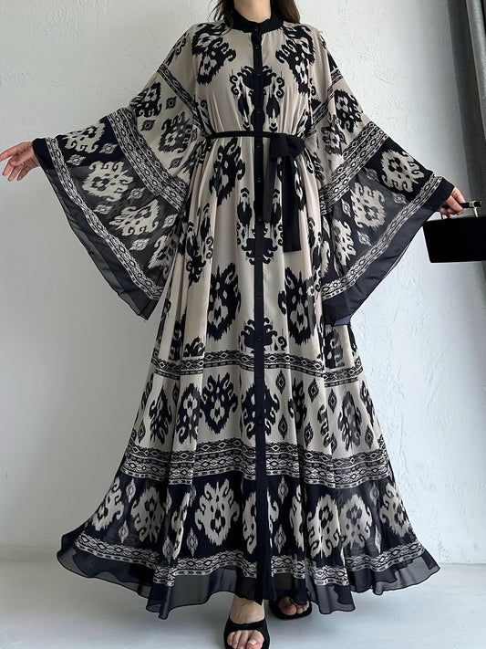 Allover print belted maxi dress with crew neck, bell sleeves, and pleats for spring & fall. Women's clothing.