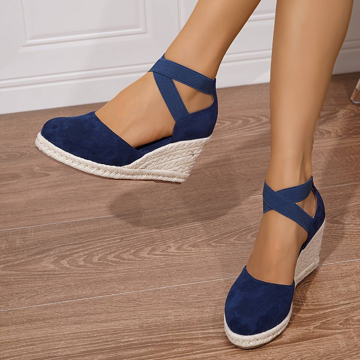 Women's slip-on wedge sandals with elastic cross straps, round toe, and non-slip sole.