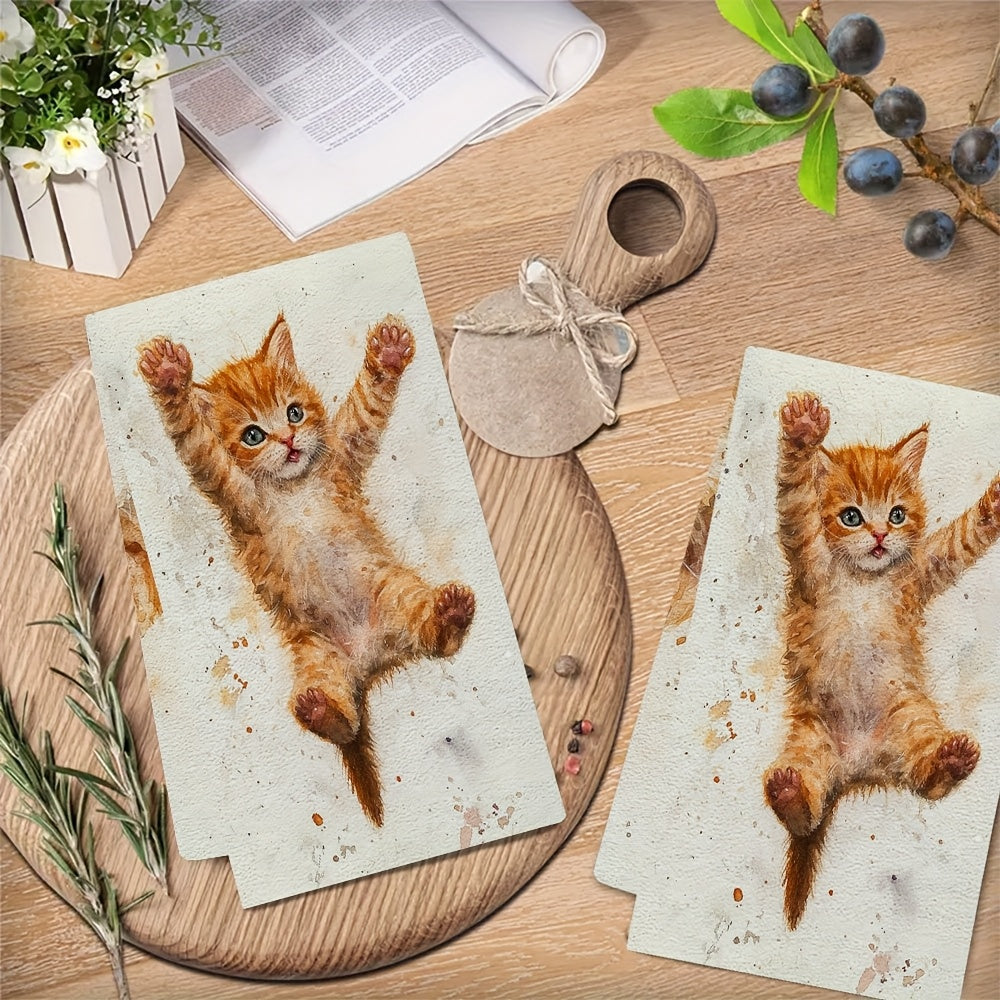 2 pieces of ultra soft kitchen towels featuring an adorable orange kitten learning to jump design. These highly absorbent and machine washable dish hand towels come in a contemporary style measuring 40.64x60.96 cm. Perfect for holiday decor, these dish