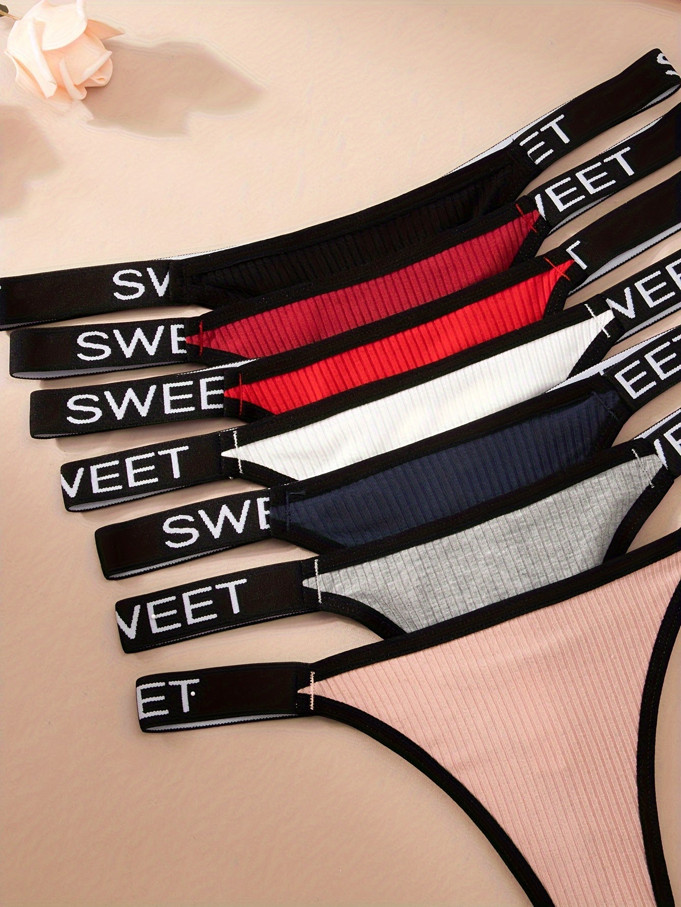 7pcs Letter Tape Contrast Binding Thongs: Sexy, comfortable, and stretchy intimates for women.