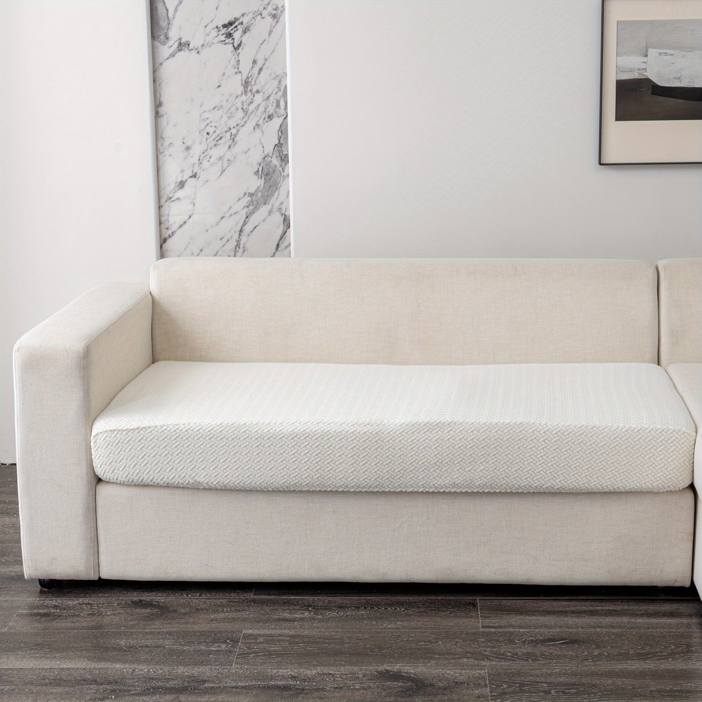 Modern gray sofa cushion cover with elastic fit and soft textured fabric. Machine washable for enhanced comfort in the living room.