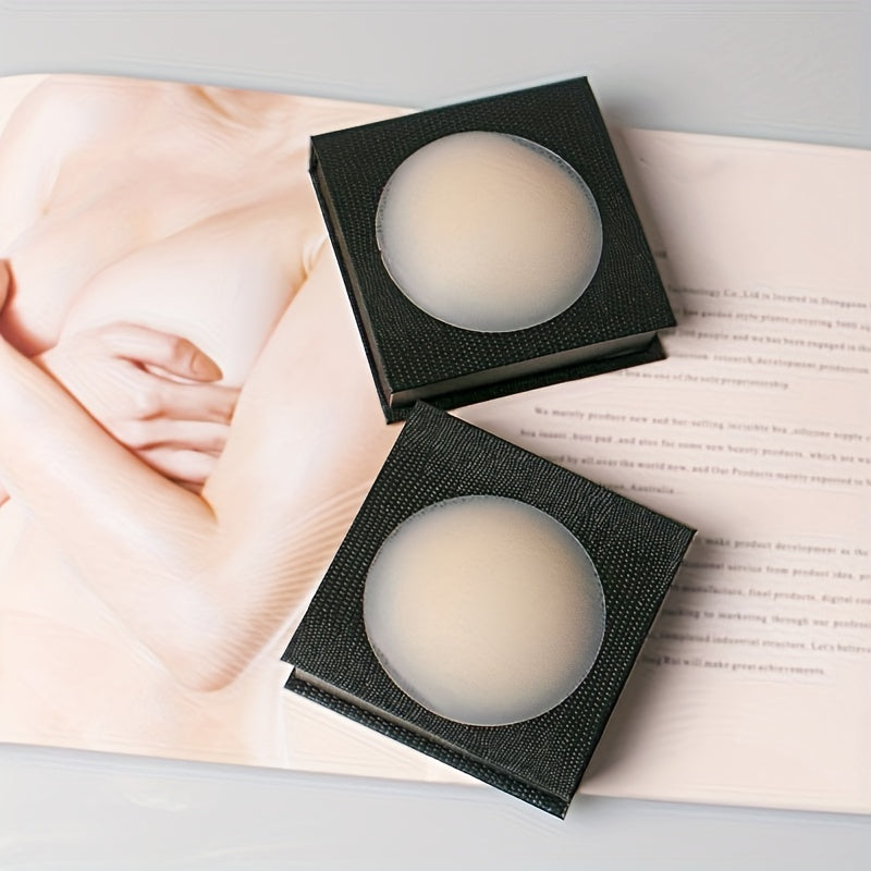 Reusable stick-on nipple covers made of invisible silicone to lift and support. Ideal for lingerie and underwear.