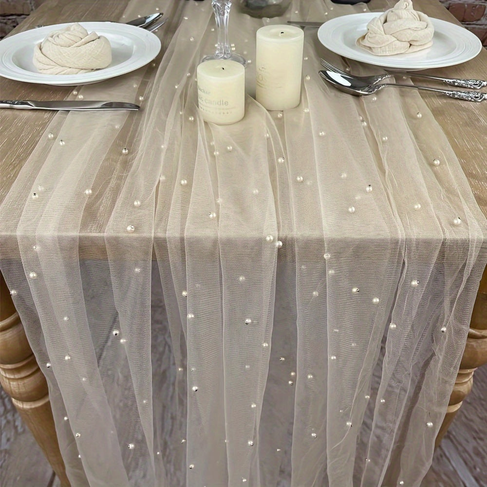 Enhance the ambiance of your special events with our Romantic Pearl Lace Table Runner. Perfect for weddings, bridal showers, and more, this elegant decoration is crafted from embroidered sheer chiffon tulle that is wrinkle-free for a luxurious look.