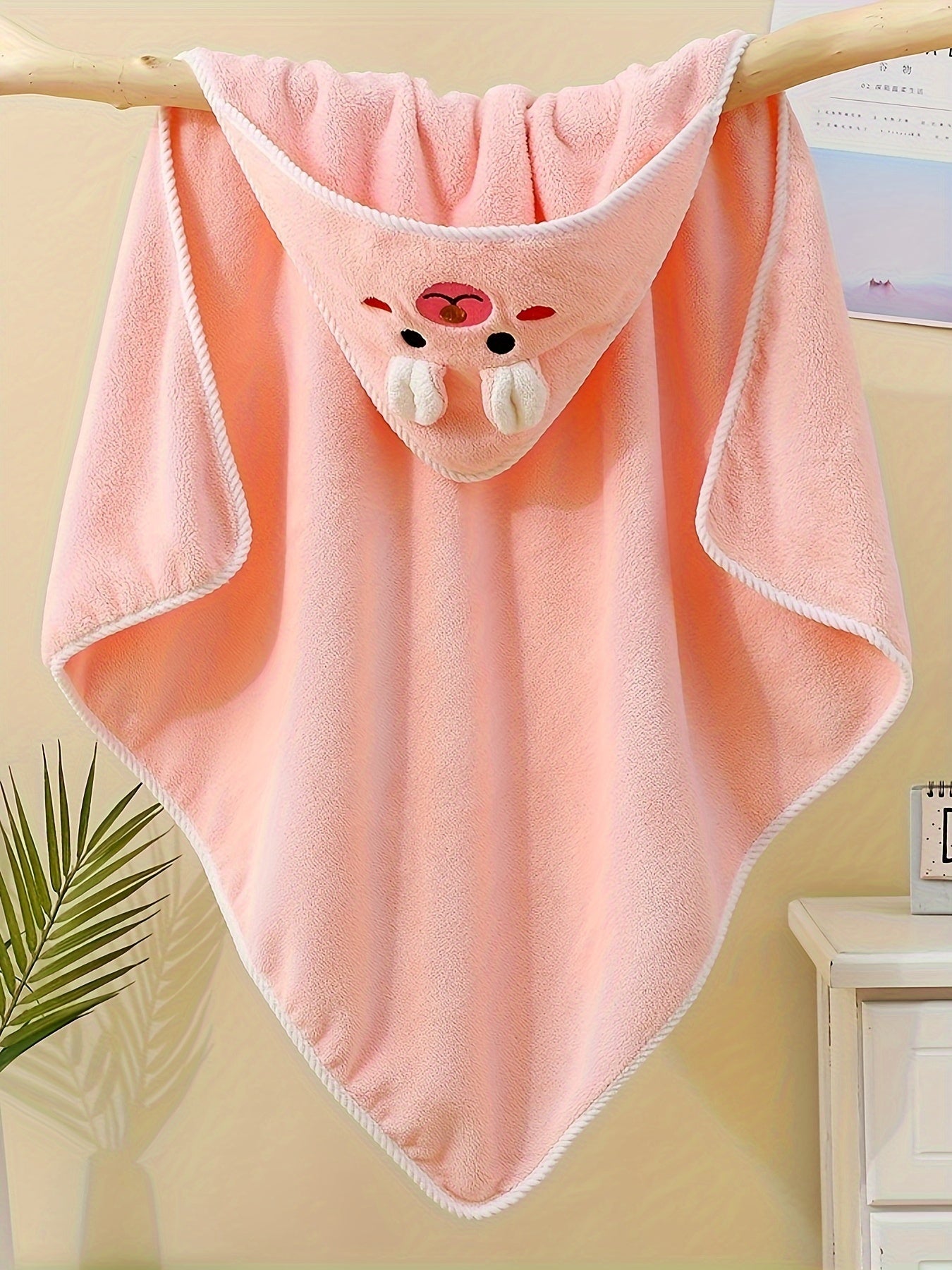 Multi-functional and highly absorbent hooded bathrobe with animal pattern for babies, ideal for swimming, beach, or bathing.