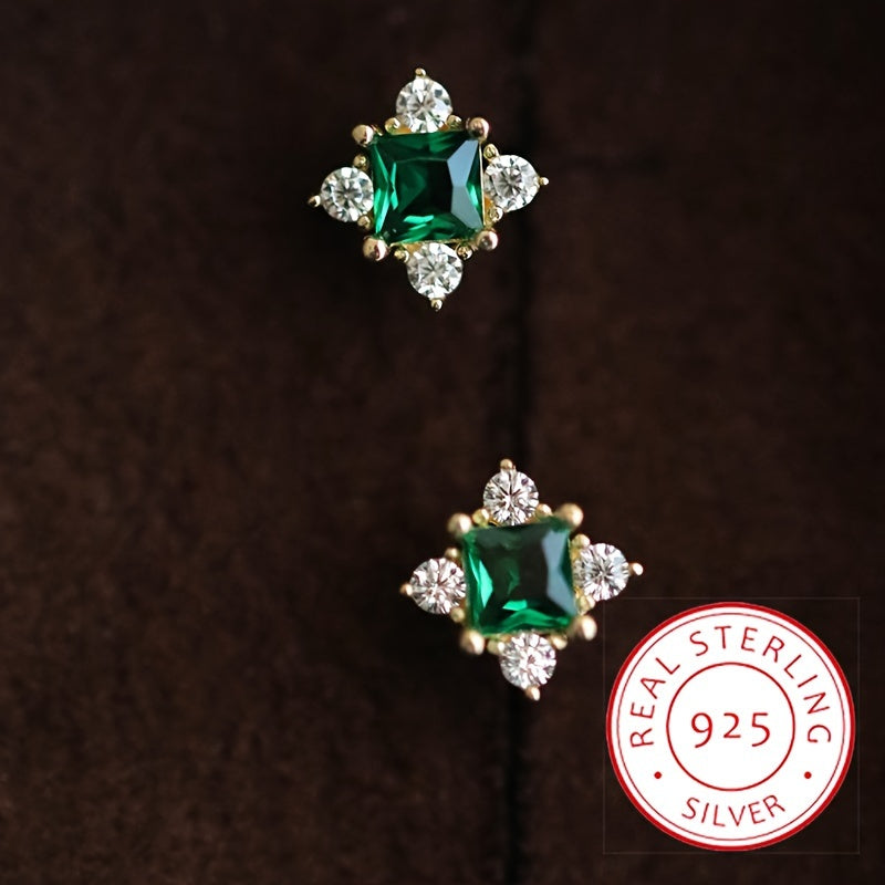 These elegant stud earrings are crafted from 925 sterling silver and feature synthetic zirconia stones. With a French vintage style and hypoallergenic screw backs, these earrings are perfect for daily wear or gifting. The celestial symbols theme and