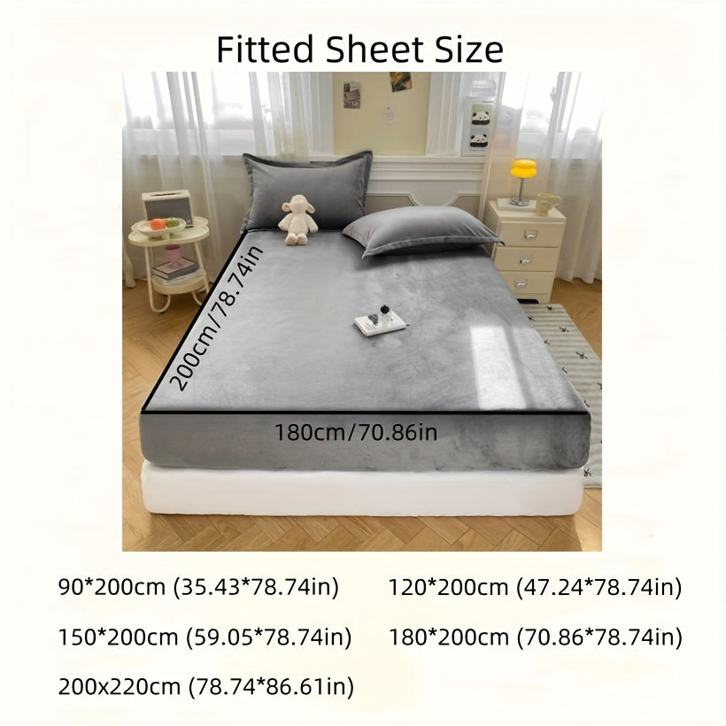 Indulge in the opulence of our Luxurious Plush Fitted Sheet, crafted from ultra-soft milk velvet for a cozy and warm feel. This easy-care sheet is machine washable and features a light gray hue with a deep pocket design for a perfect fit. Ideal for