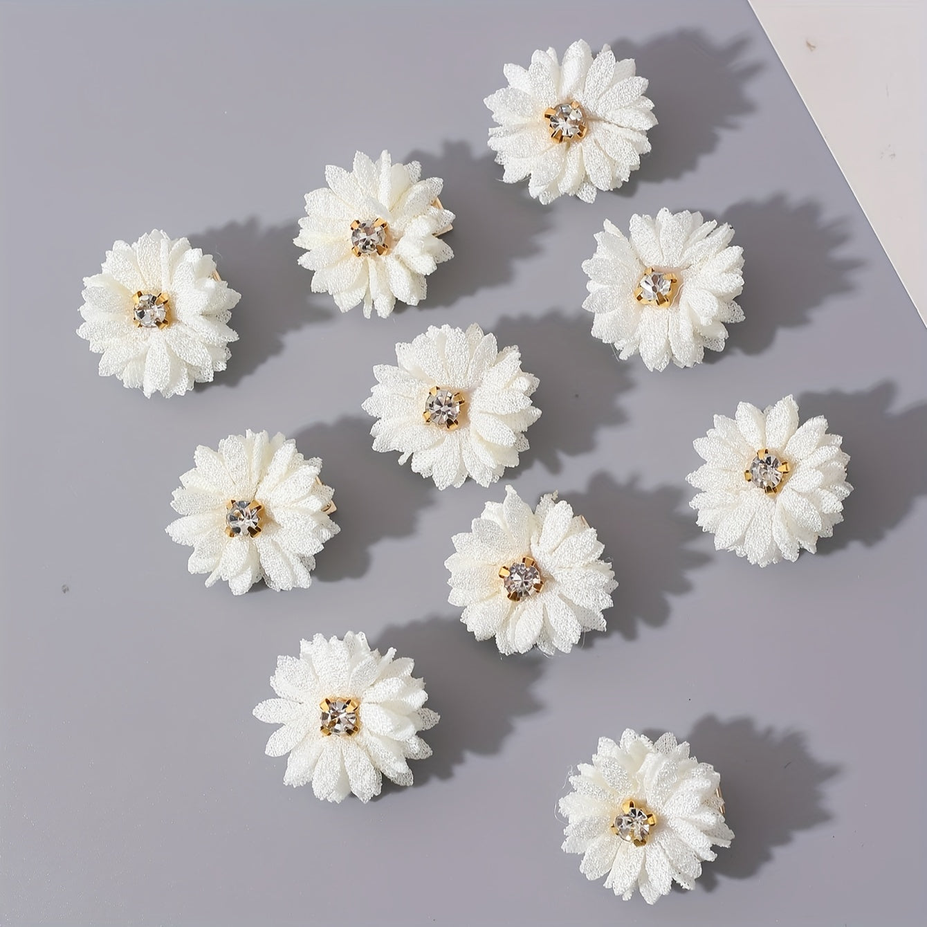 A set of 10 Chinese-style hair clips with fabric flowers and rhinestone centers in white, perfect for parties and daily wear.