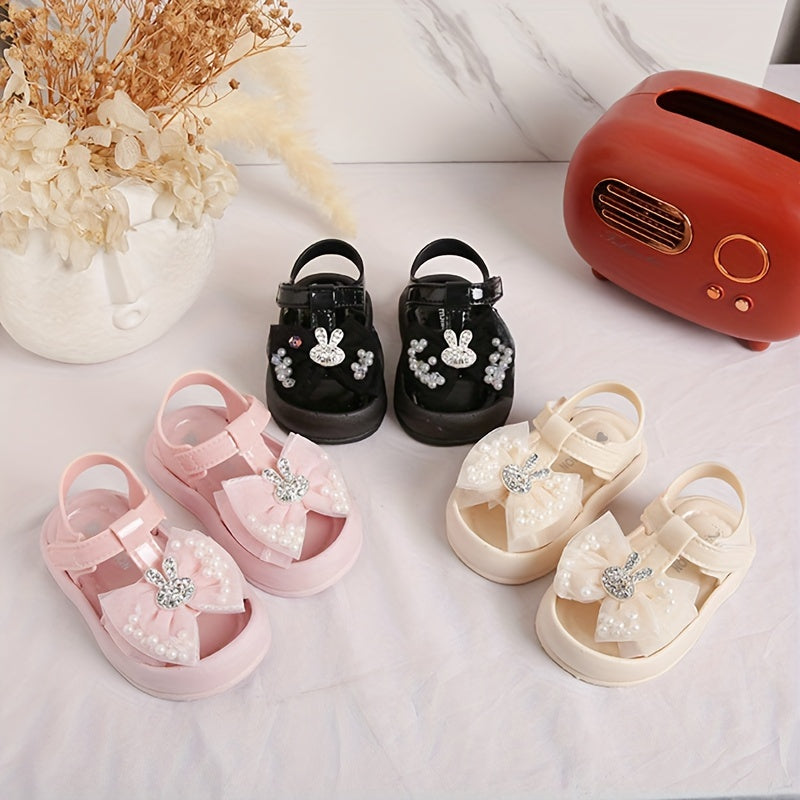 New 2024 baby girl sandals with anti-kick feature, cute rabbit design, and soft soles for beach.