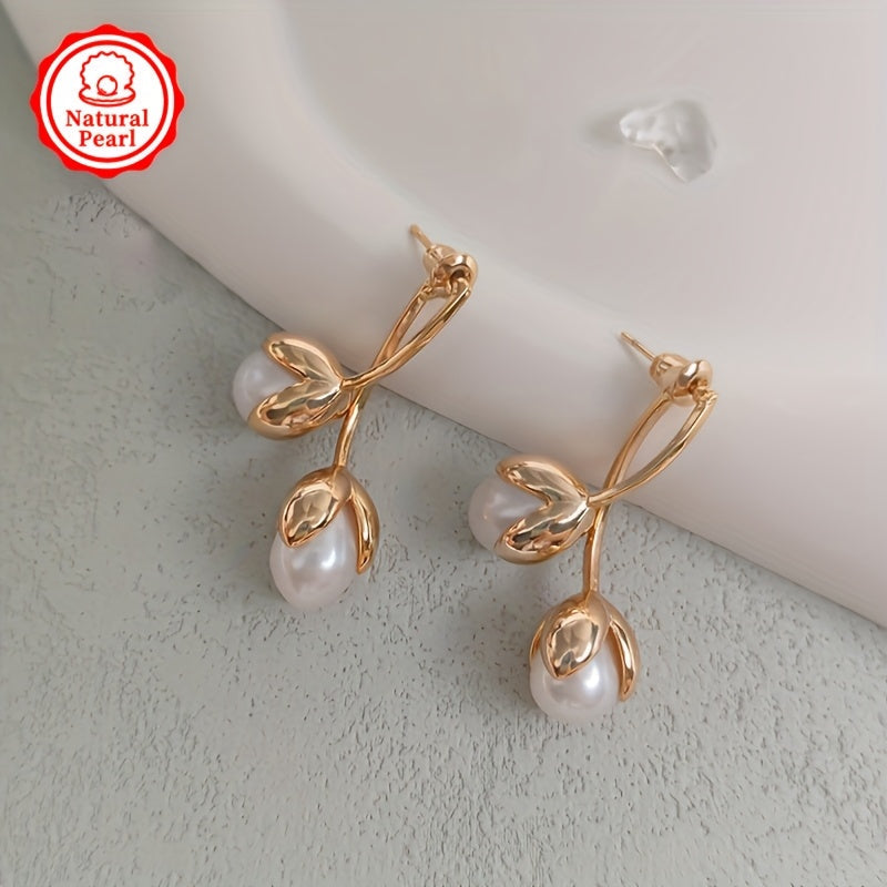 Vintage and elegant pearl drop and dangle earrings for women with natural freshwater pearls, measuring 8mm. Made with alloy ear needles and no plating. Features June birthstone. Comes in a gift box, perfect for daily wear. Includes one pair.