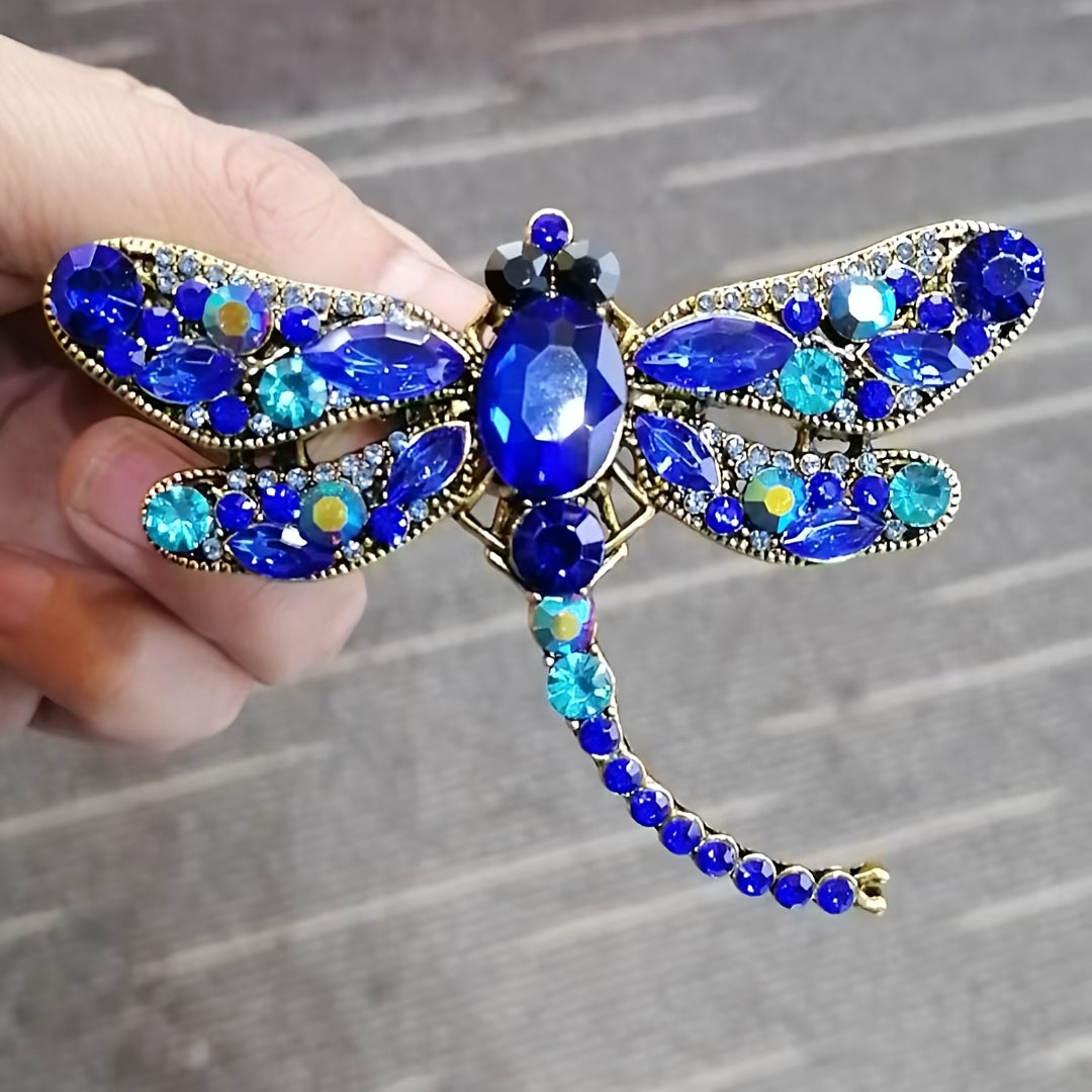 Dragonfly-shaped brooch with a retro design, adorned with sparkling rhinestones. Perfect for adding a touch of elegance to women's dresses, coats, sweaters, or corsages.