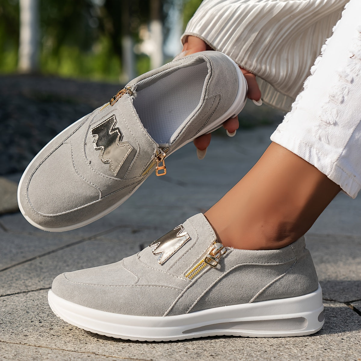 Red slip-on sneakers for women with zipper, low top style, lightweight, PU cover sole, white and golden accents.