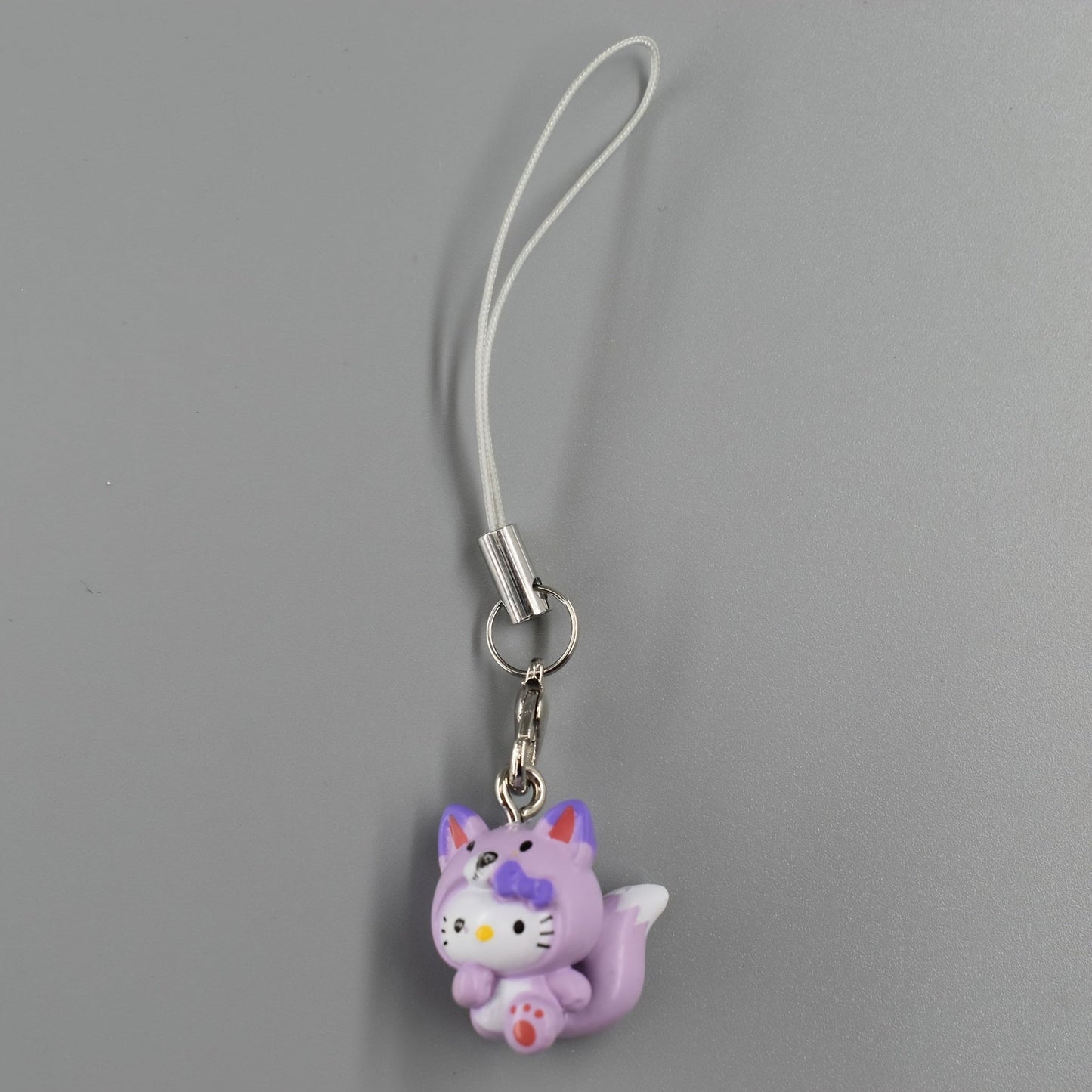 Two adorable strawberry-themed cat phone charms, perfect for adding a fun touch to backpacks or keychains. These DIY decorations make great birthday gifts for friends.