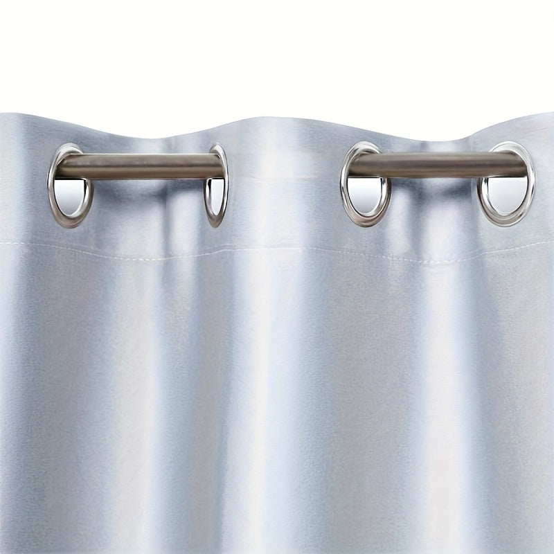 Two pieces of 100% blackout curtains made from polyester, coated and insulated with a grommet top design. Perfect for bedroom, living room, and home decor.