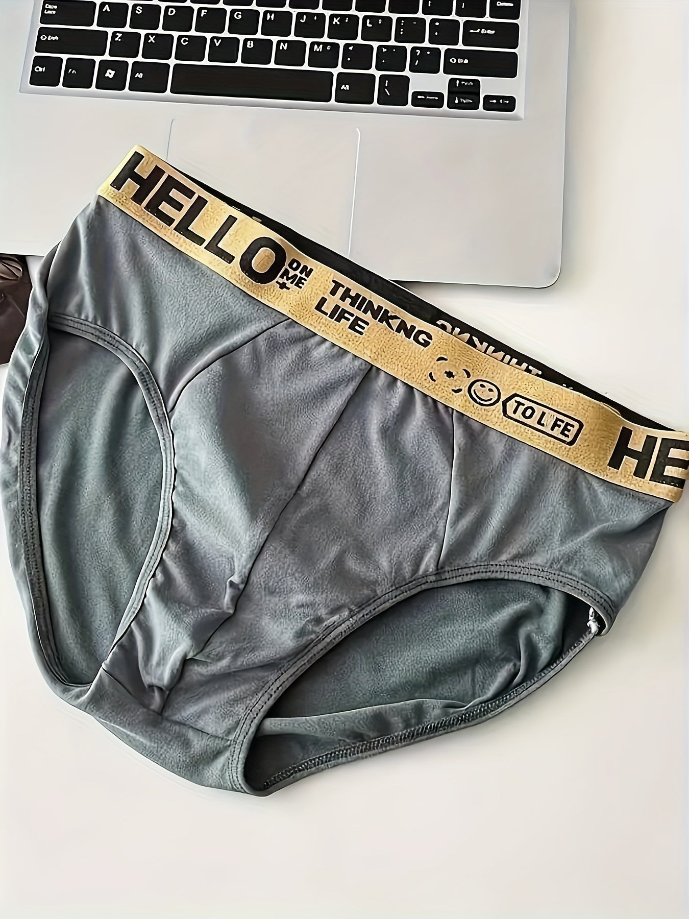 10 Men's 'Hello' Print Fashion Briefs made of cool polyester-spandex blend with elastic waistband, perfect for summer wear.