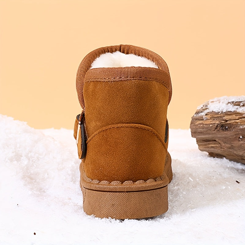 Children's winter boots with cozy fleece lining, warm and breathable, slip-on style with metal buckle straps, available in black and brown for boys and girls.