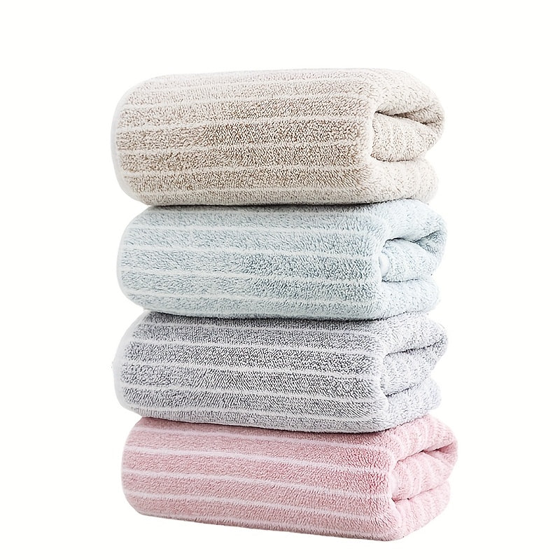 A 140cm*70cm plush bath towel perfect for home, hotel, kitchen, and more. Ultra-absorbent, soft, and gentle on skin.