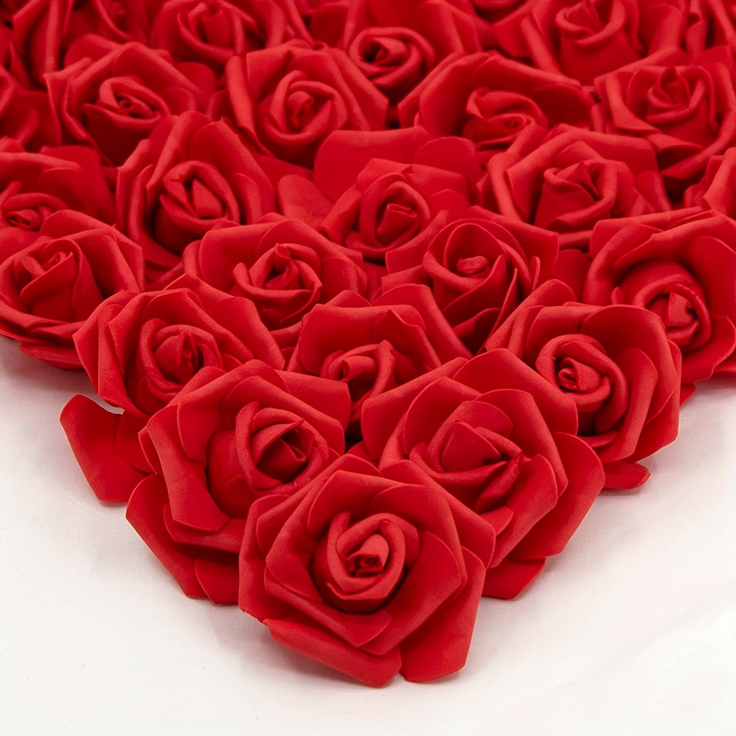 50 pack of luxurious PE foam artificial rose flower heads for various occasions - perfect for DIY crafts, weddings, and home décor throughout the year.