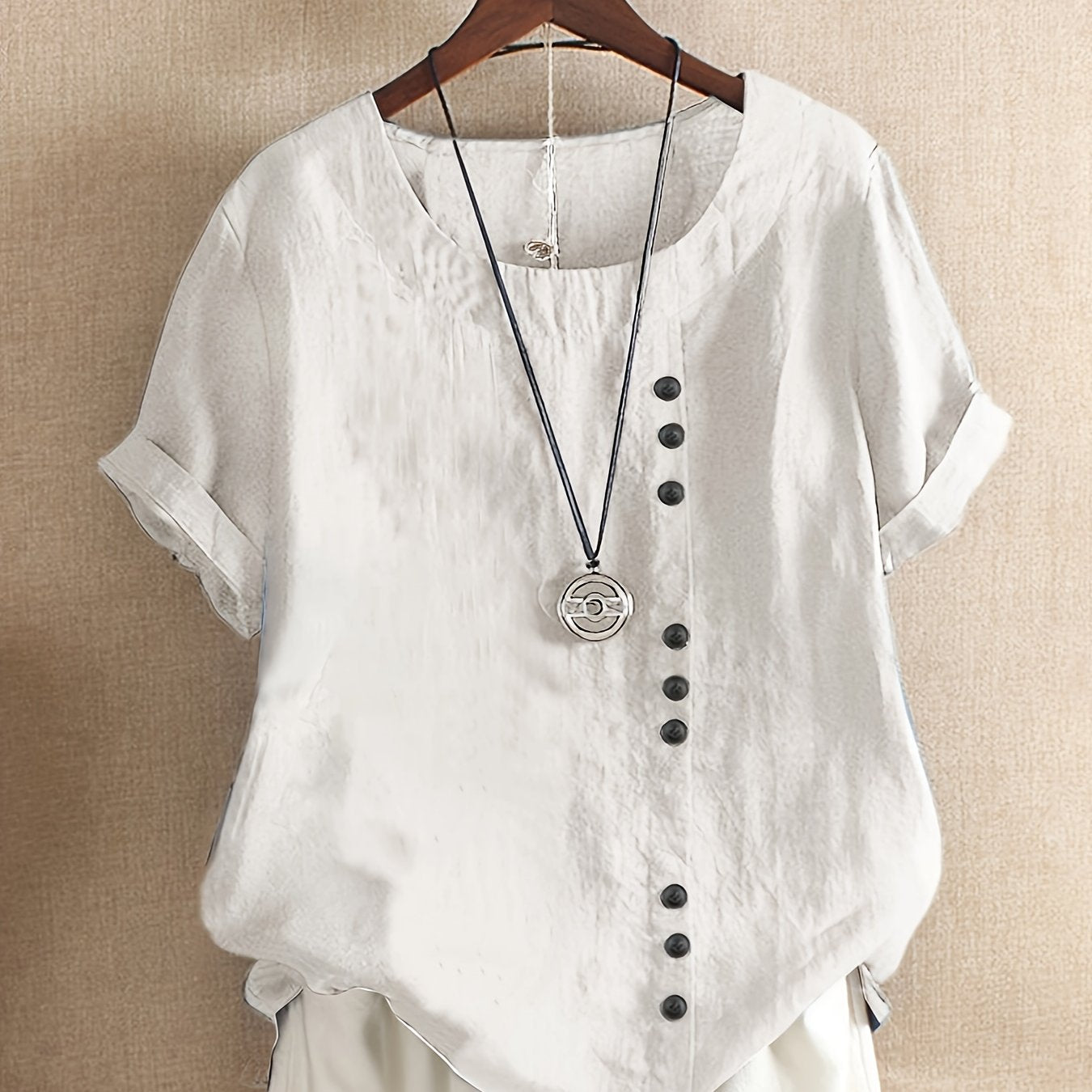 Stylish cotton button-up shirt in solid color, ideal for spring/fall