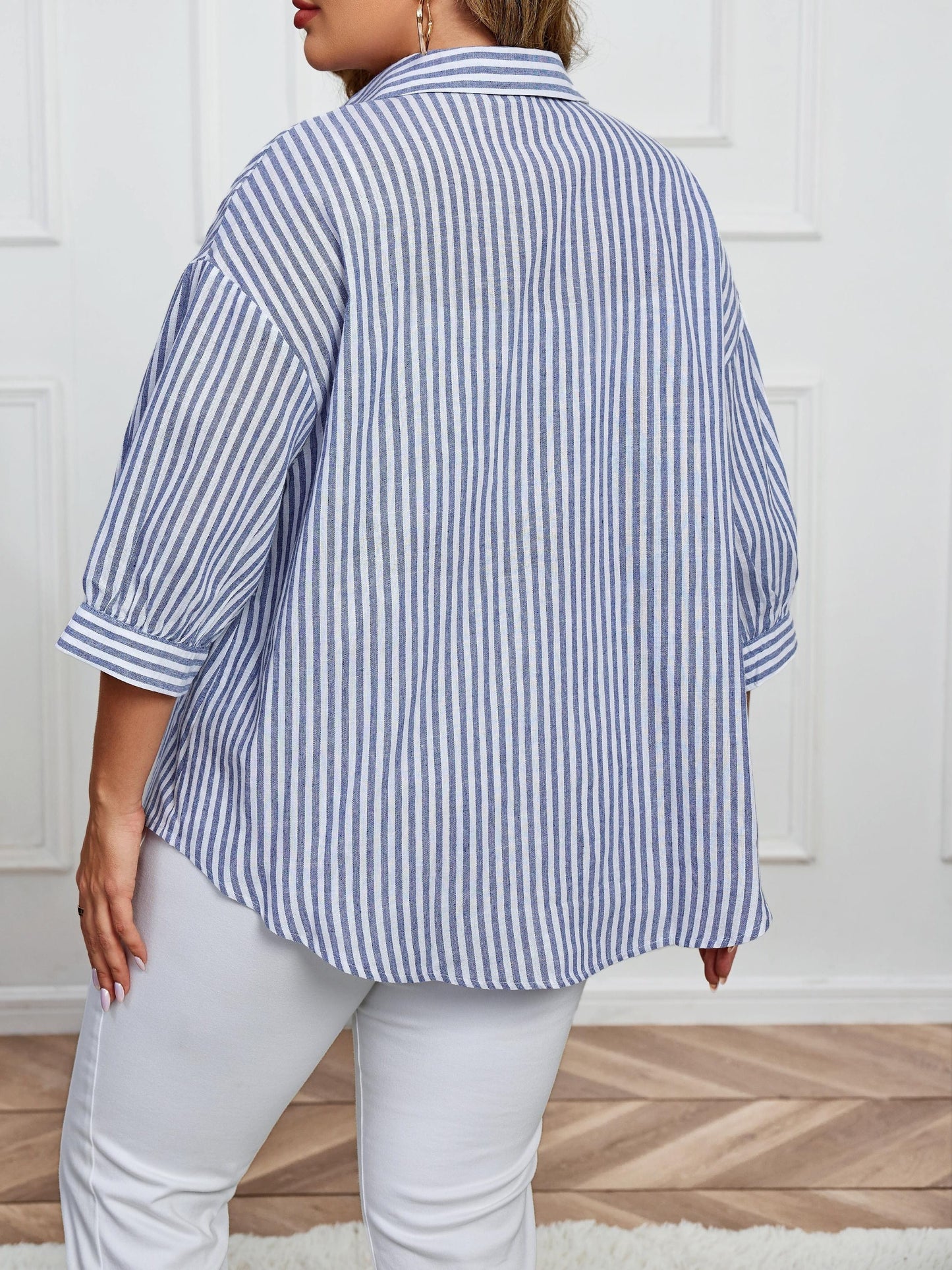 Stylish women's button-up shirt with stripes, long sleeves, and a classic collar. Made from a non-stretchy polyester blend, machine washable for all-season wear.