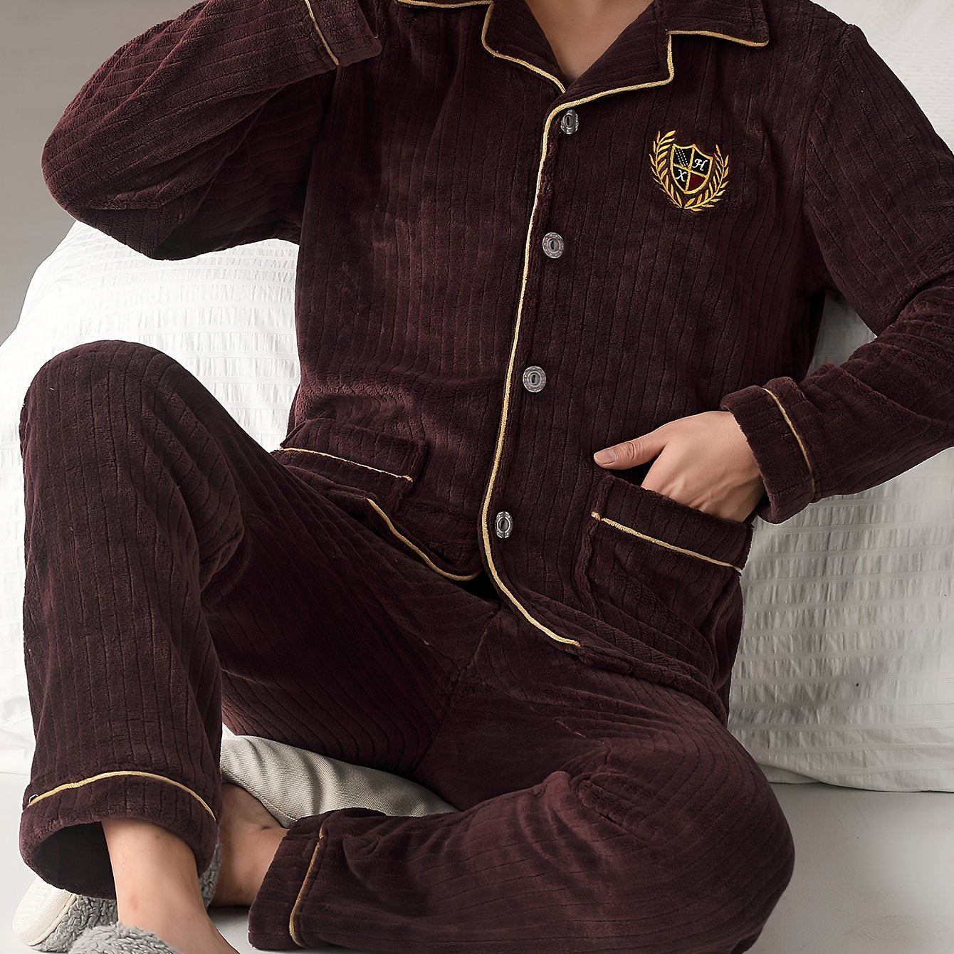 Men's cozy flannel pajama set with lapel collar top and solid color loose fit pants made from 100% polyester knit fabric for fall/winter.