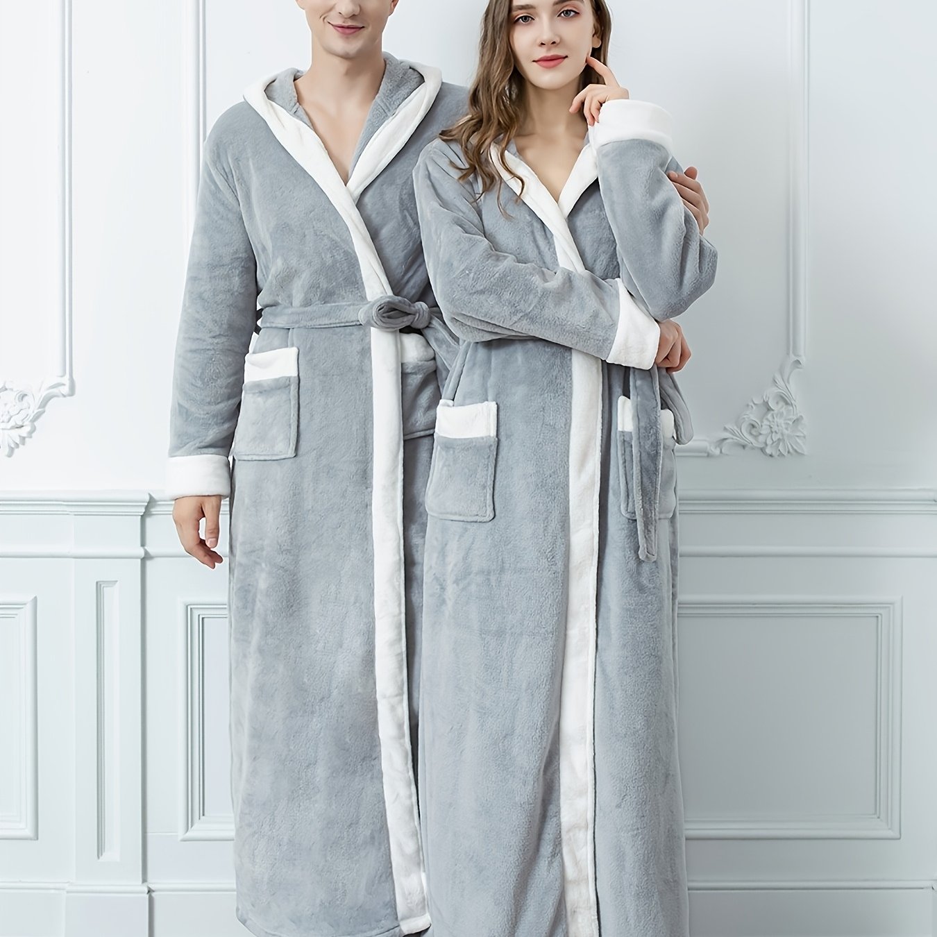 Luxurious light grey hooded bathrobe for both men and women, with long sleeves, pockets, and soft polyester material. Ideal for autumn and winter comfort.