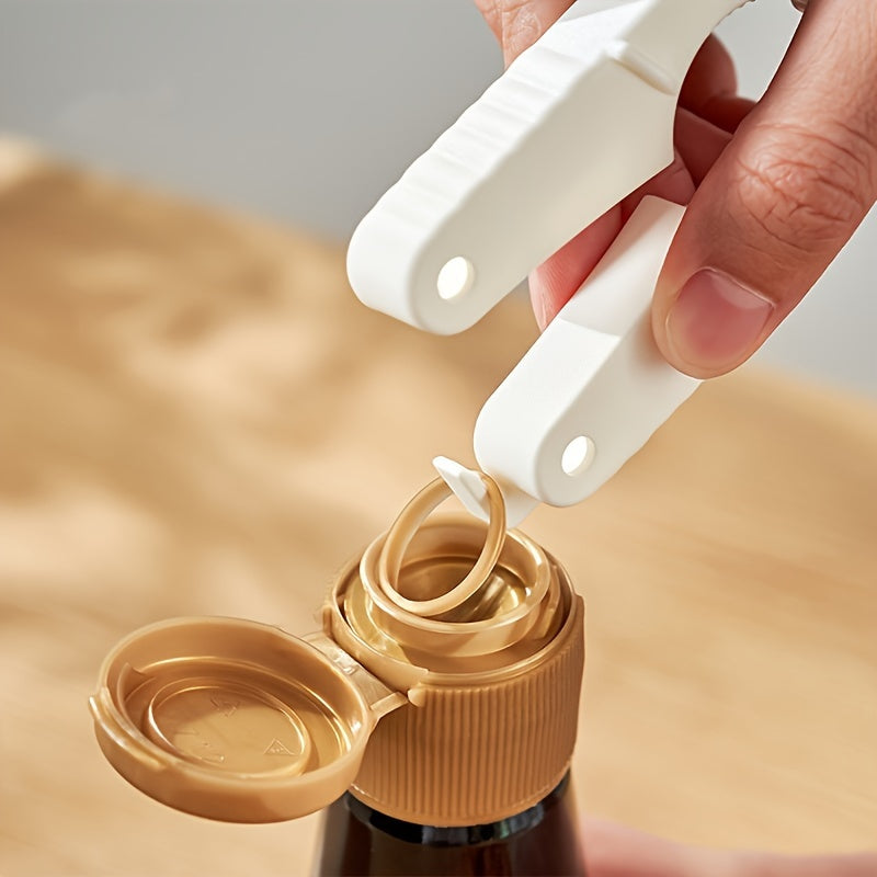 Magnetic bottle opener with multiple functions - lifts caps, opens jars and cans, tightens bottle caps, no power required, made of plastic.