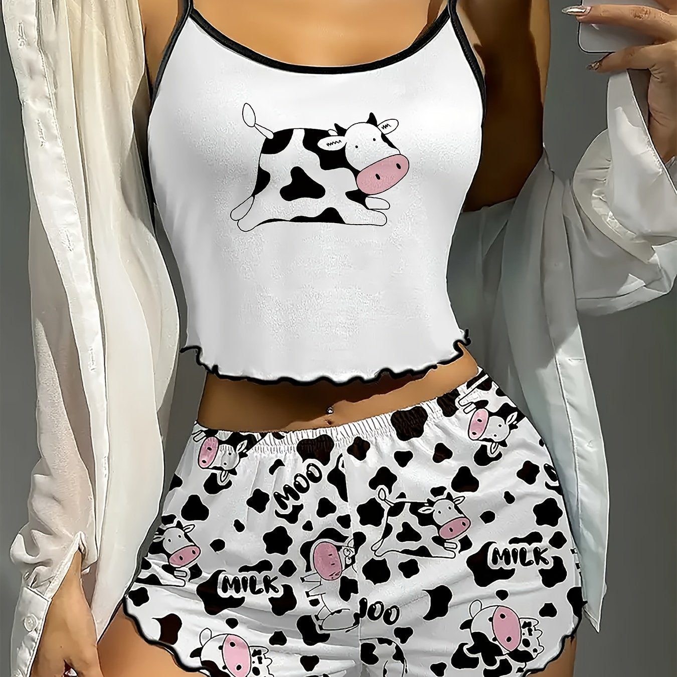 Cow print lounge set including a backless cami top and elastic shorts for women.