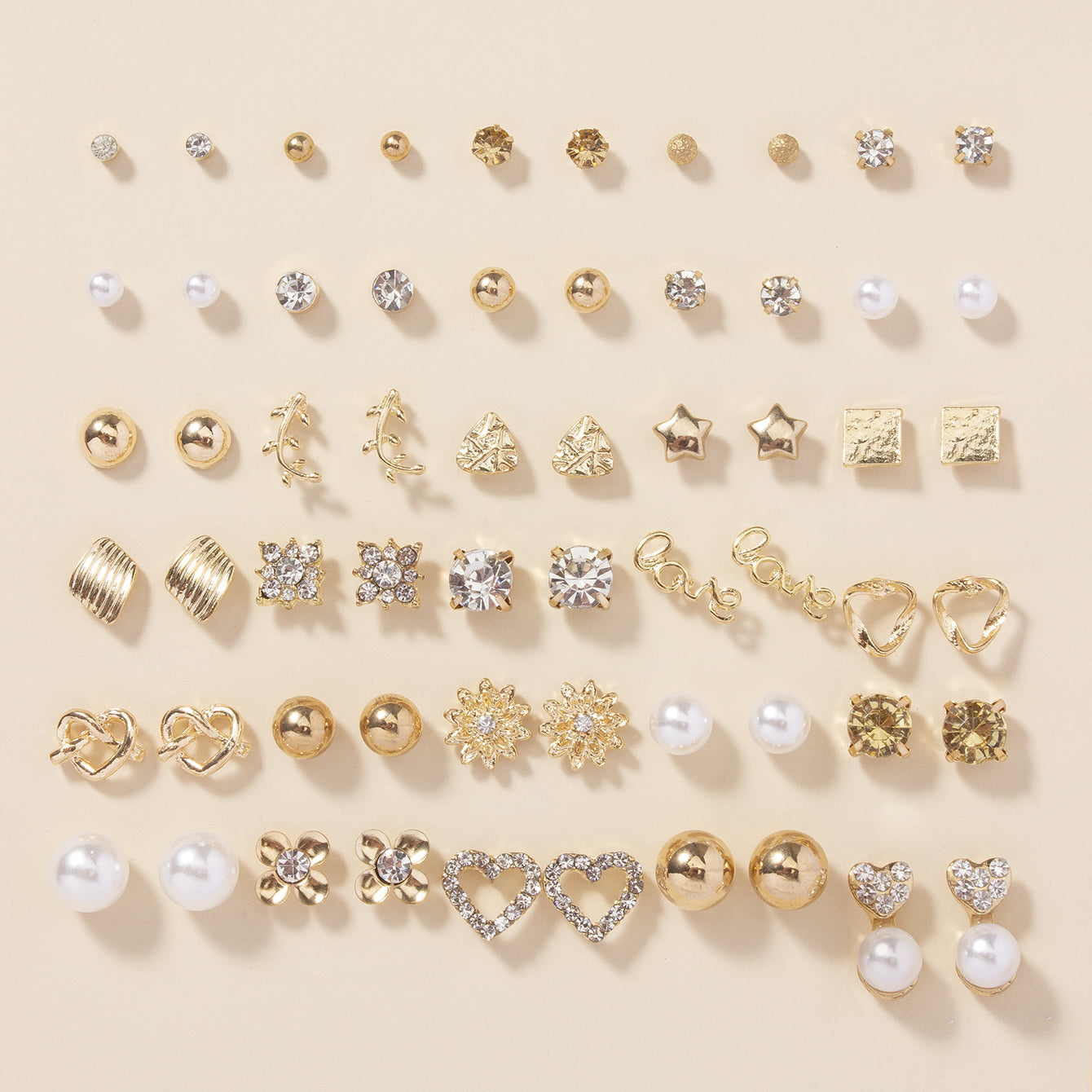 Set of 30 pairs of stud earrings, featuring a combination of alloy material, full rhinestones, faux pearls, and round love letters.