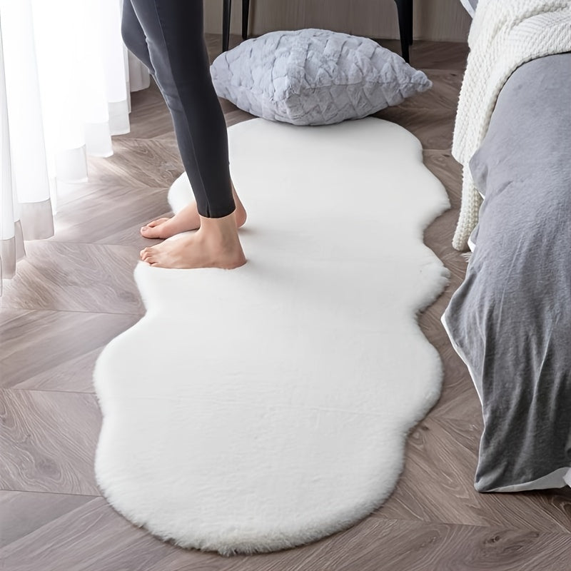 Pamper your space with this gorgeous Faux Rabbit Fur Area Rug, known for its luxurious softness and plush feel. This stain-resistant beauty is perfect for enhancing the decor of your bedroom or living room. Its unique shape adds style to any room, but