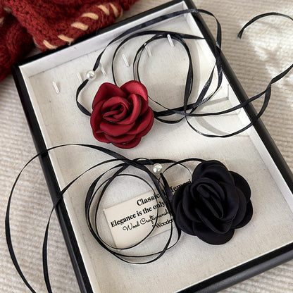 Set of 4 vintage rose flower choker necklaces made of polyester fabric for women.