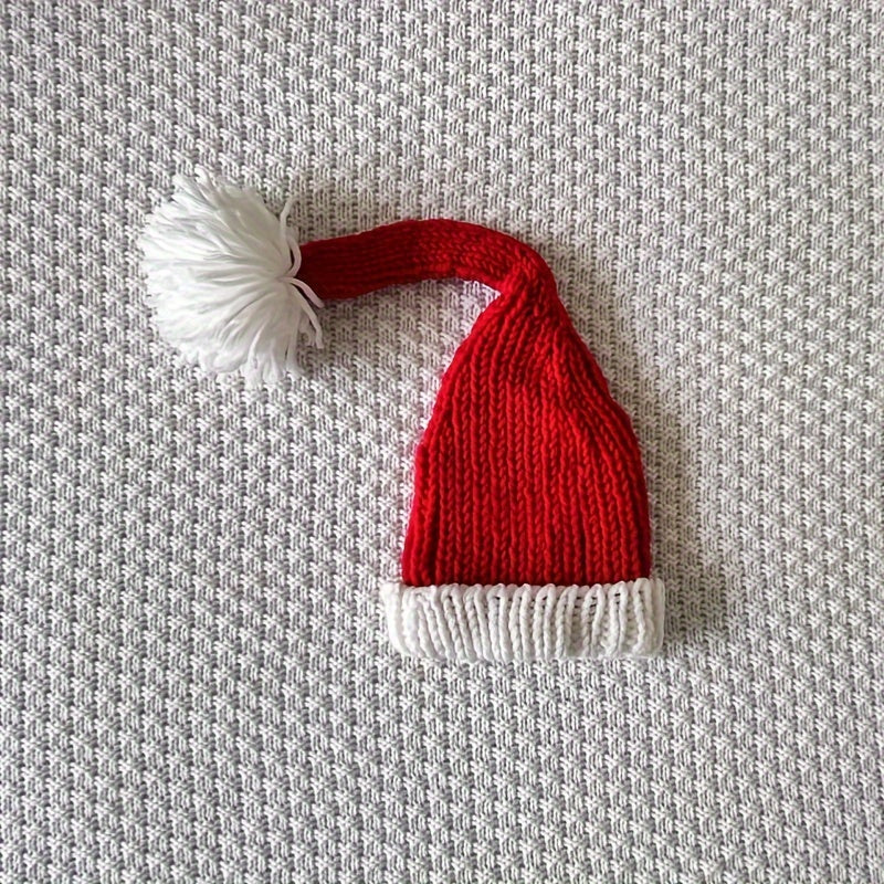 Christmas themed crochet outfit for newborn photography, handmade with love. This Baby Santa Hat and Pants Set is made with high-quality acrylic fiber and is suitable for infants aged 0-3 years. A perfect keepsake gift for your baby's first Christmas and