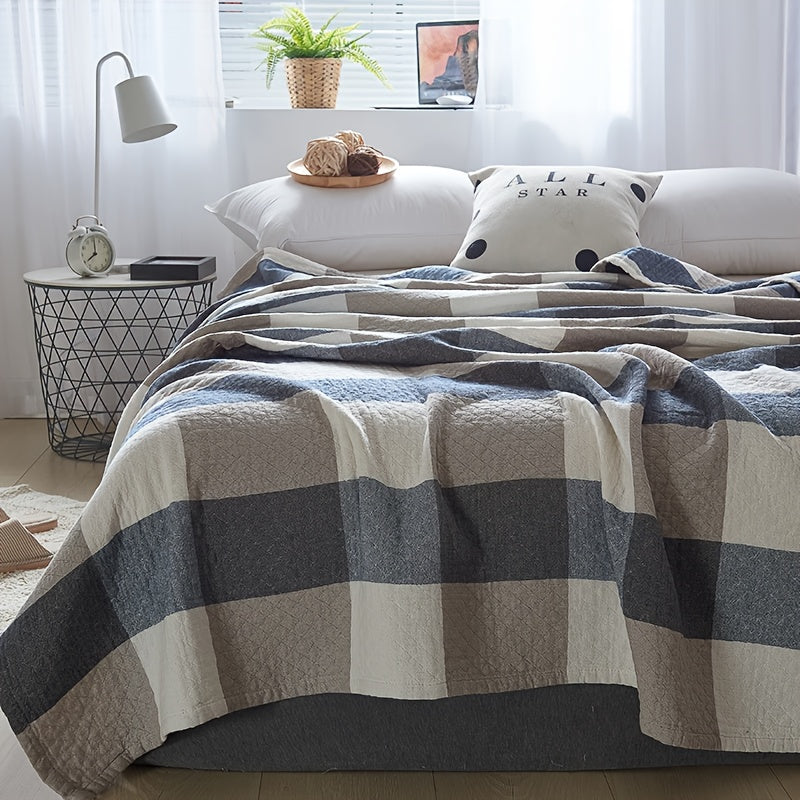 High-Quality Boho Checkered Lightweight Quilt made of 100% cotton with a 40s thread count. Features a neutral grey and white plaid design suitable for modern farmhouse and bohemian