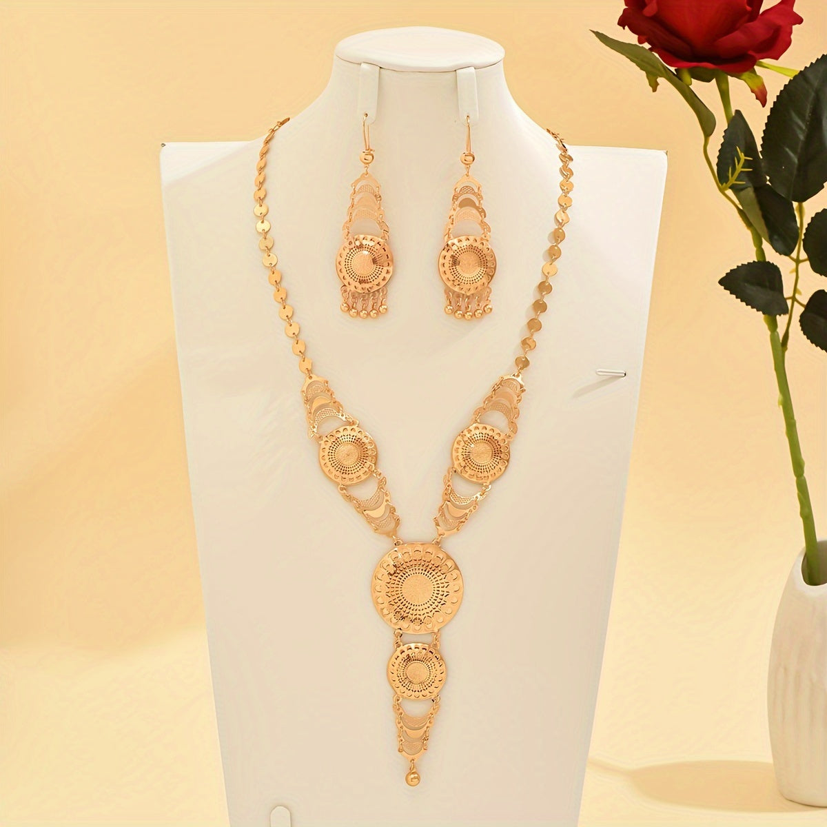 Retro Ramadan inspired copper gold plated necklace and earrings set featuring a creative sun flower design and tassel detail. Perfect for adding an elegant touch to women's party and wedding attire.