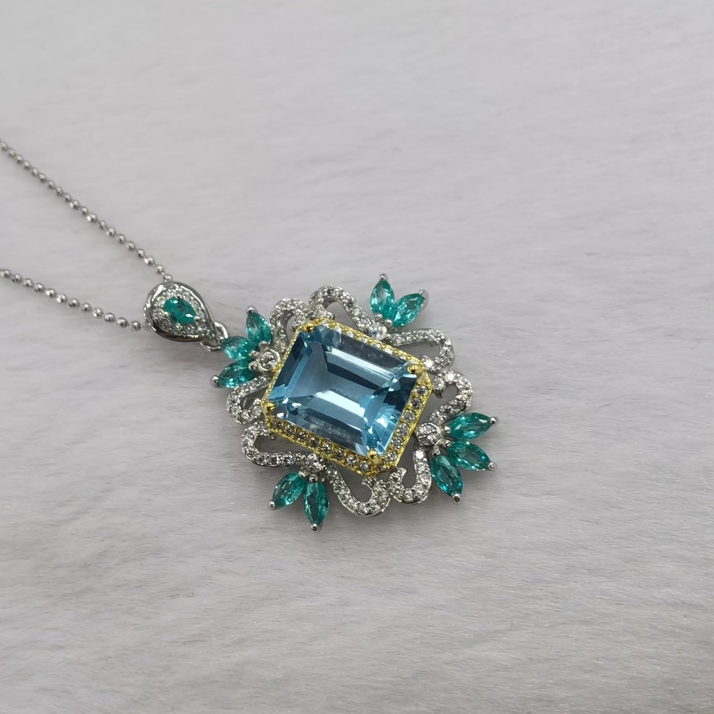 Stylish and lavish 14K gold plated alloy pendant necklace featuring synthetic crystal and imitation topaz, designed in a fashionable European style with high carbon drill rhinestones for women. Perfect for everyday wear and as a gift.