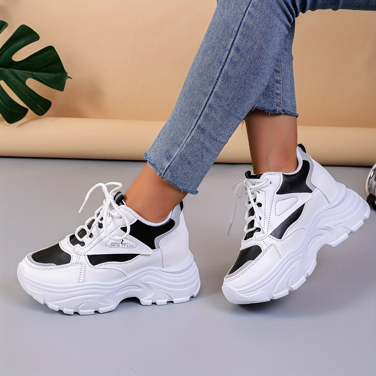 Chunky sneakers for women featuring a casual lace-up design and trendy wedge sports shoes.