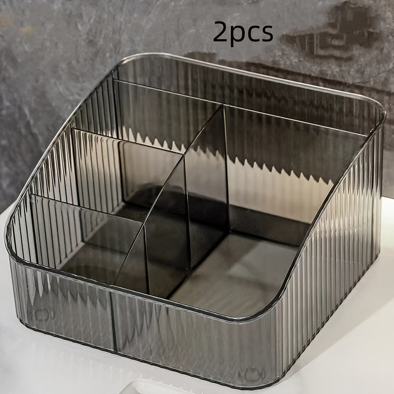 Transparent PET cosmetic organizer with 5 compartments. Ideal for makeup and office supplies. Portable, lightweight, and polished finish. Great desk accessory.