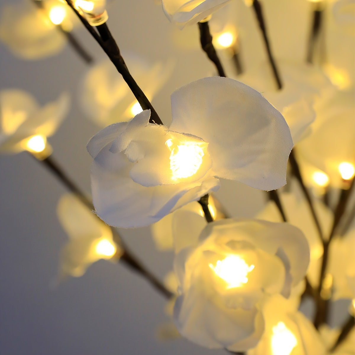 White Phalaenopsis LED light tree, battery-operated, suitable for various occasions and indoor decorating.