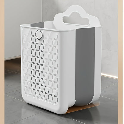 Contemporary wall-mounted laundry basket made of durable plastic with handles. Measures 39x27x19cm and is foldable for easy storage. Can be used as a bathroom organizer or multipurpose hollow bucket for toys, snacks, fruits, and vegetables. Features a