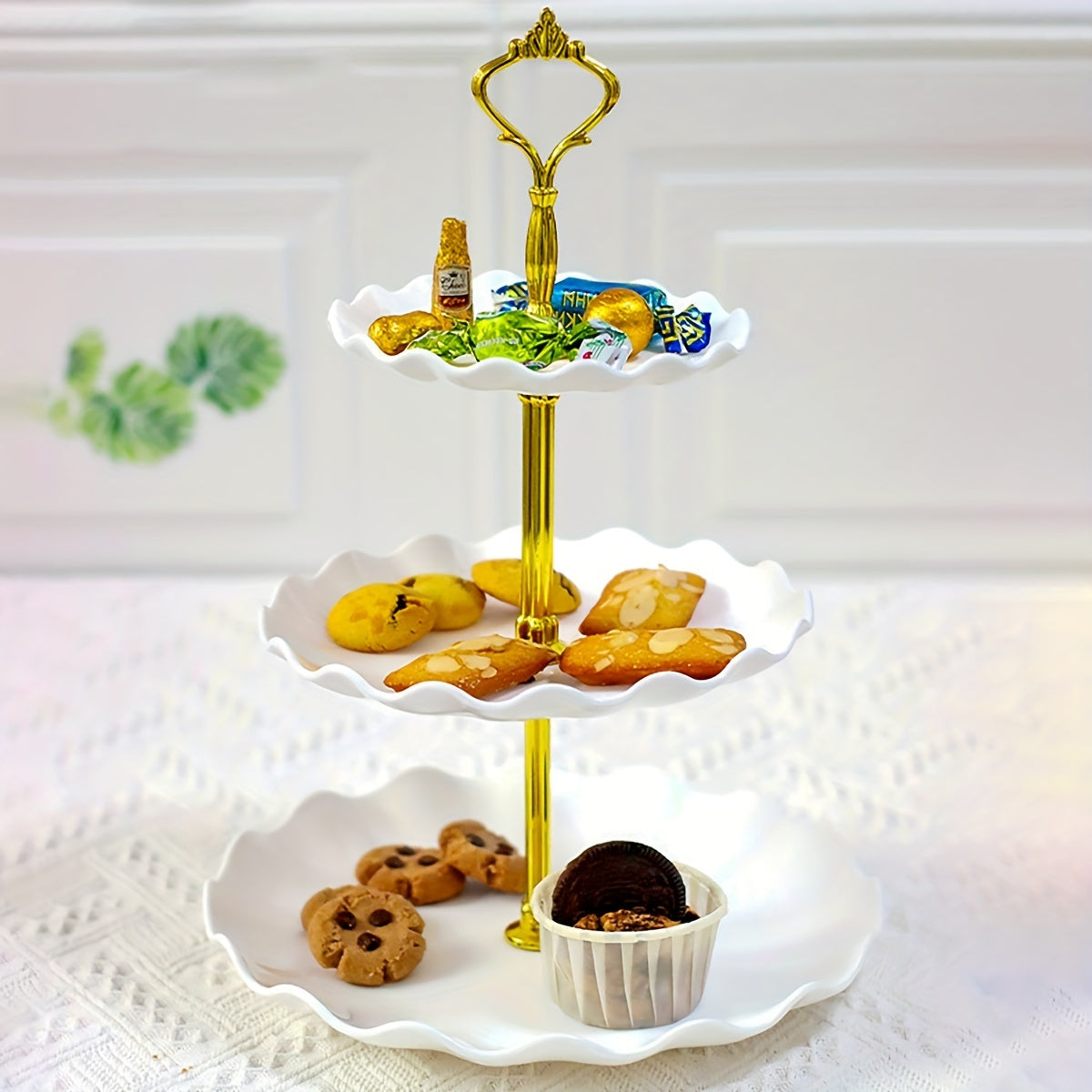 Elegant 3 tier cupcake stand with ruffled or lacy design perfect for tea parties, weddings, and more. Ideal for decorating and serving desserts at any occasion.