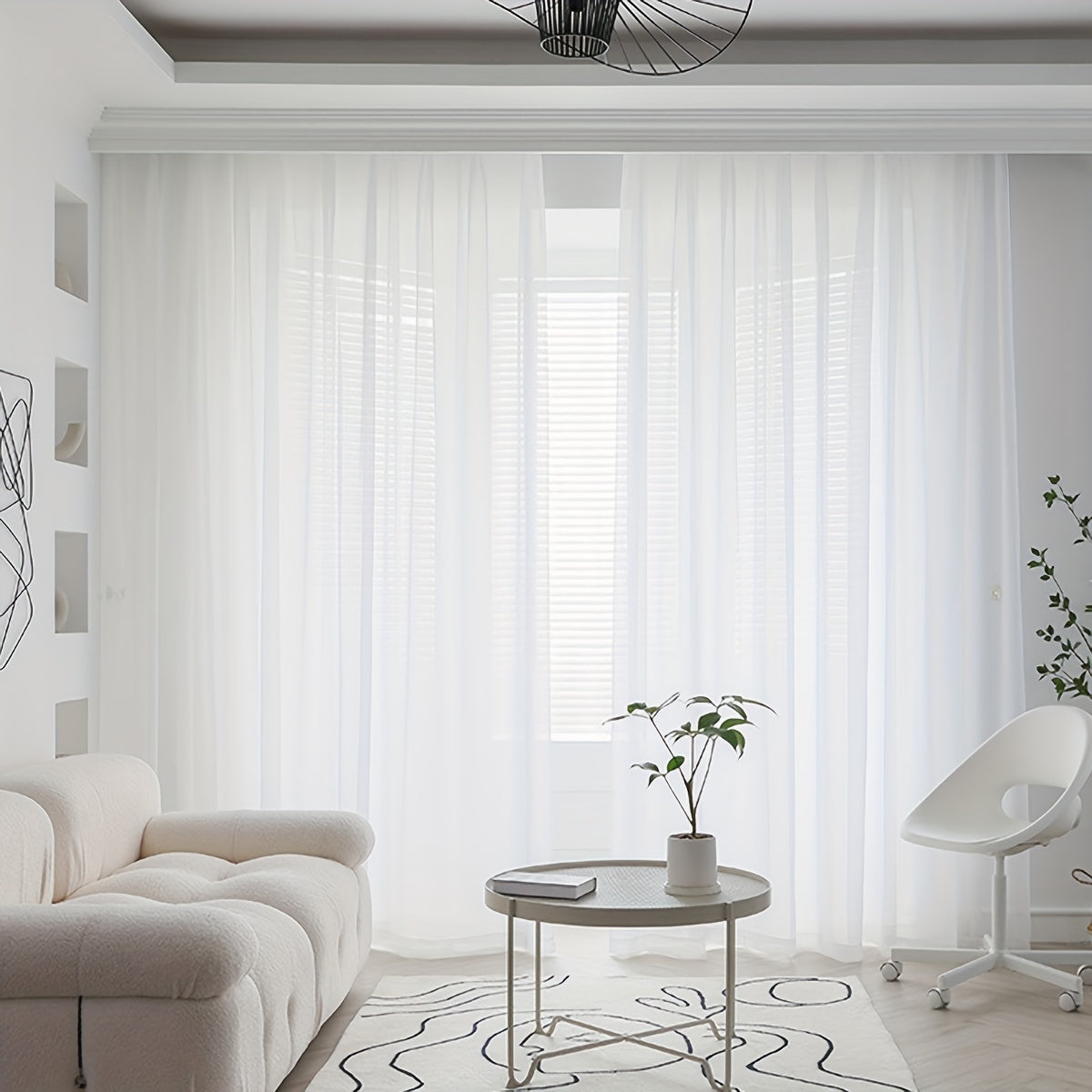 Transform your living room, bedroom, or office with this elegant sheer curtain in pure white - Lightweight and translucent with a rod pocket design, perfect for enhancing your home decor.