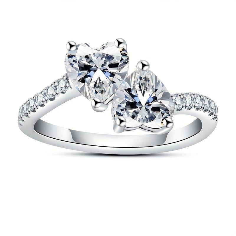 Gift your friends and BFFs this fashionable and novel Women's Eternal Ring, featuring a 925 Silver Moissanite 6.5mm Heart shape main stone with 2CT, adorned with 0.012*14 side stones. The ring weighs a total of 4.6g, making it a stunning accessory for