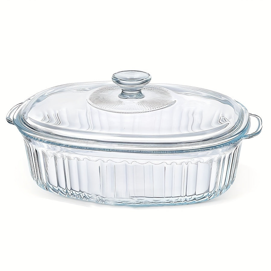 Oval clear glass casserole dish with lid and handles, versatile for microwave, oven, and dishwasher use - ideal for preparing fish, salads, and pasta.